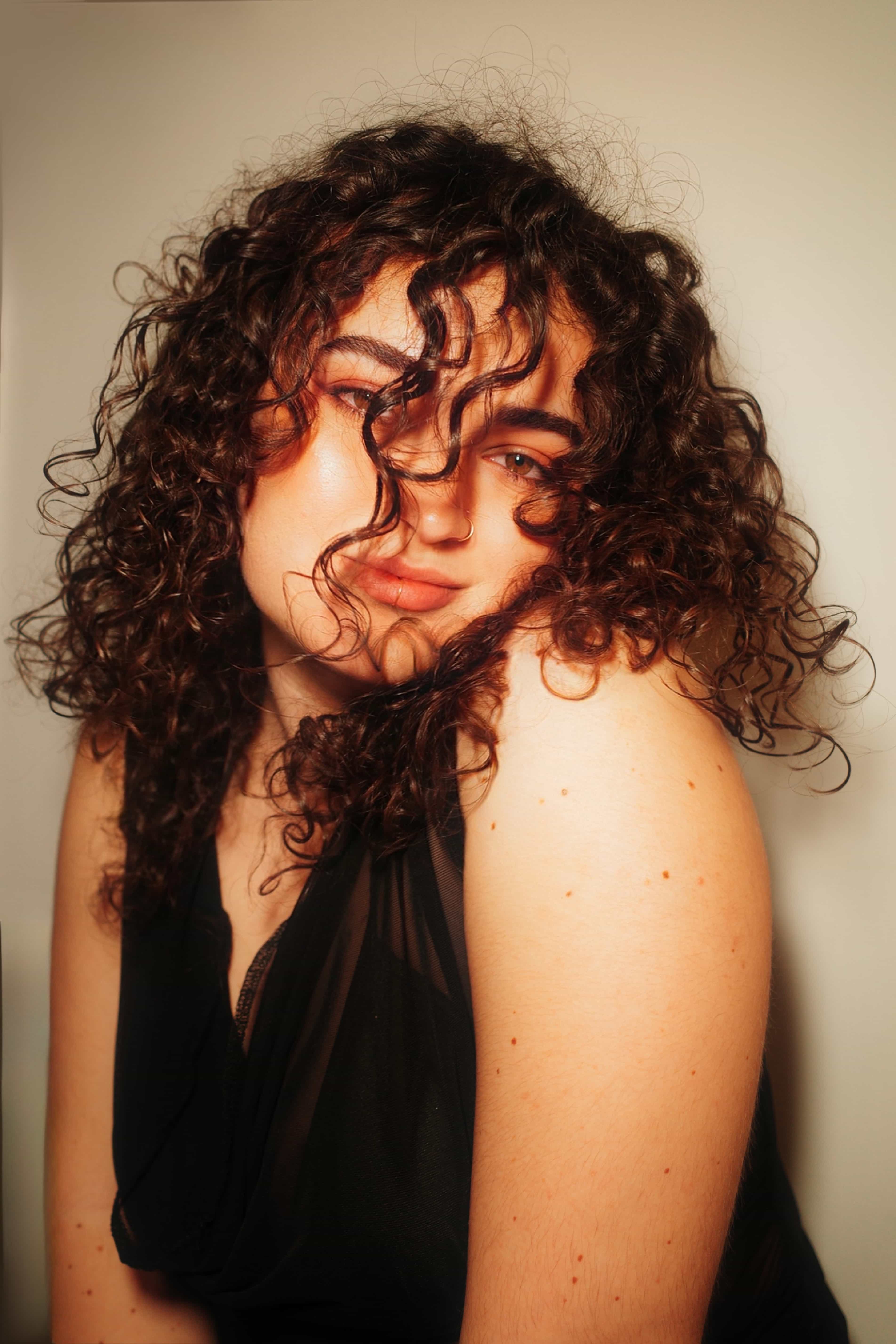 Portrait with curls, warm tones